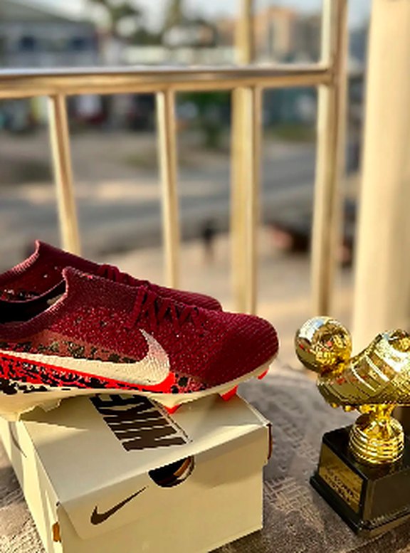 Burgundy glitter football boots