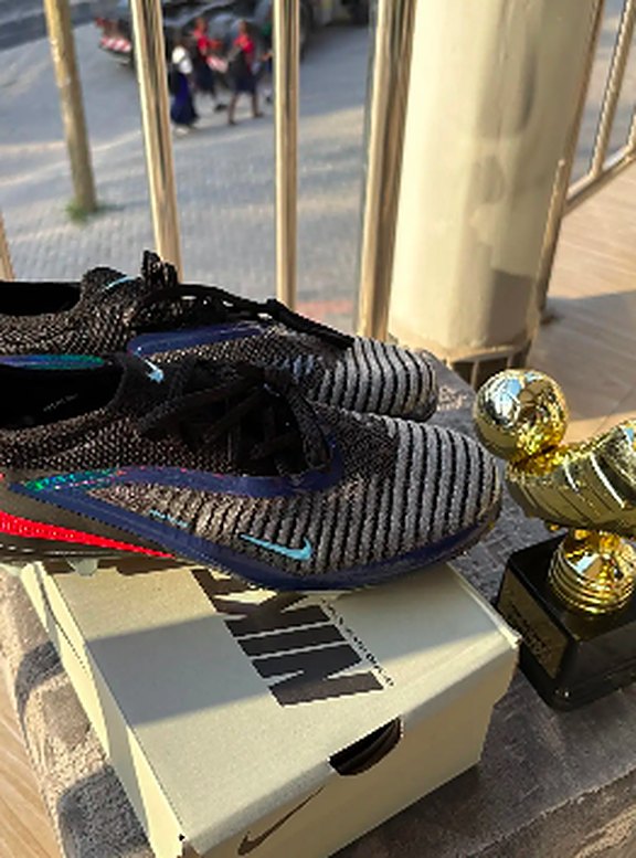 Grey knit football boots