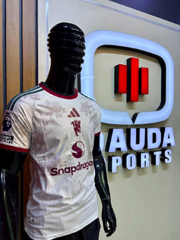 Manchester United cream jersey