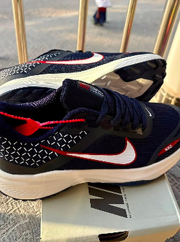 Navy and white running shoes
